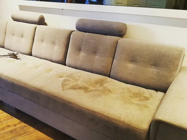 Beige fabric sofa - before cleaning
